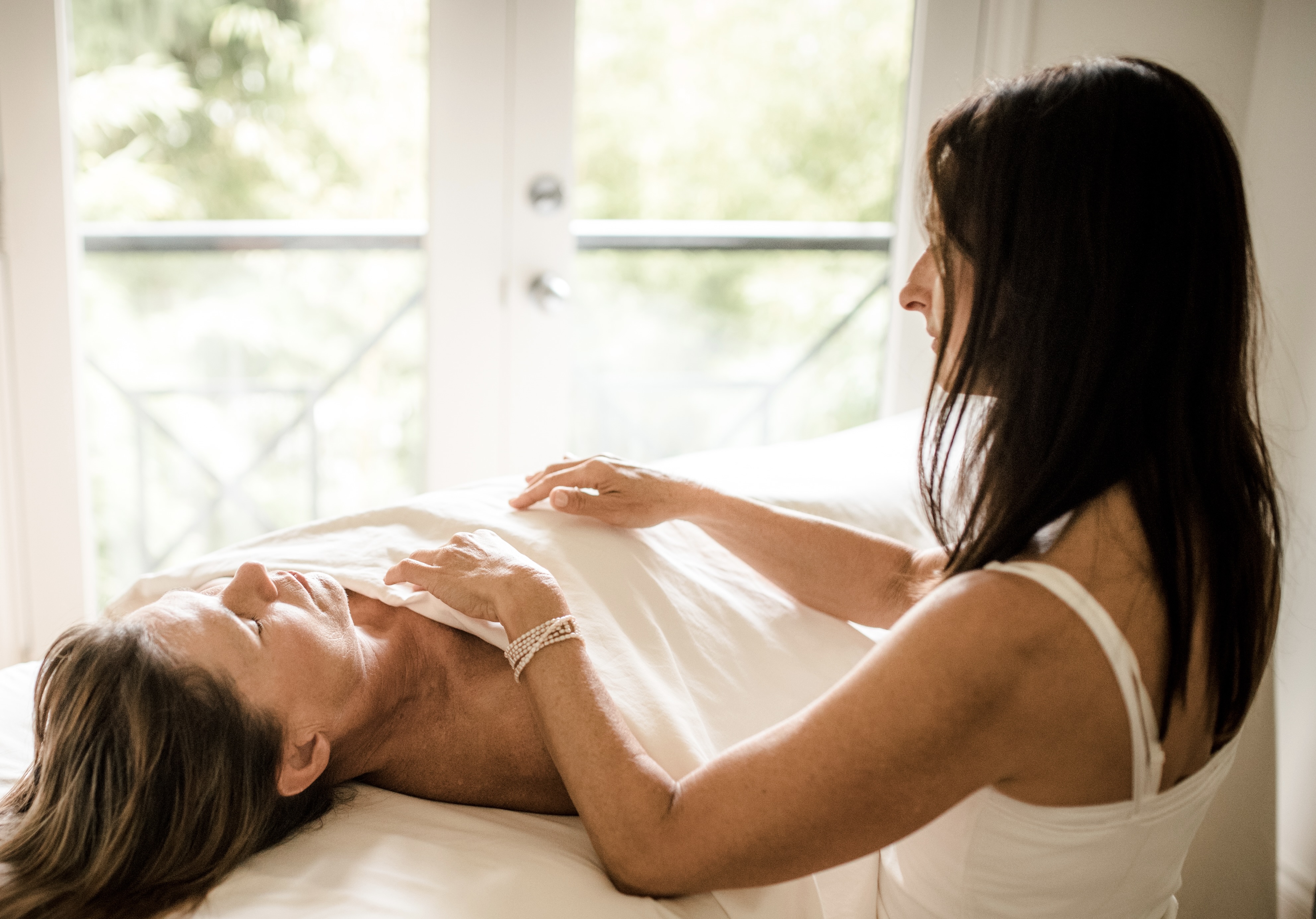 Isabella Scandolari providing Biodynamic Craniosacral Therapy to a client